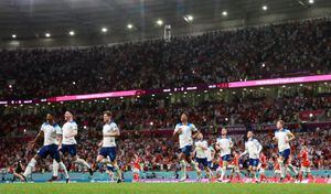 Soccer Football - FIFA World Cup Qatar 2022 - Group B - Wales v England - Ahmad Bin Ali Stadium, Al Rayyan, Qatar - November 29, 2022 General view as England's Marcus Rashford celebrates scoring their first goal with teammates REUTERS/Hannah Mckay