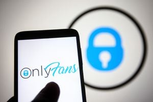 UKRAINE - 2021/08/20: In this photo illustration, OnlyFans logo of a content subscription service is seen displayed on a smartphone. (Photo Illustration by Pavlo Gonchar/SOPA Images/LightRocket via Getty Images)