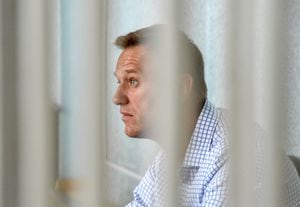 (FILES) In this file photo taken on June 24, 2019 Russian opposition leader Alexei Navalny attends a hearing at a court in Moscow. - EU foreign ministers will discuss the case of Alexei Navalny when they hold talks on April 19, 2021, Germany said, as fears grew of the hunger-striking Kremlin critic's deteriorating health while he is being held in a Russian penal colony. (Photo by Vasily MAXIMOV / AFP)