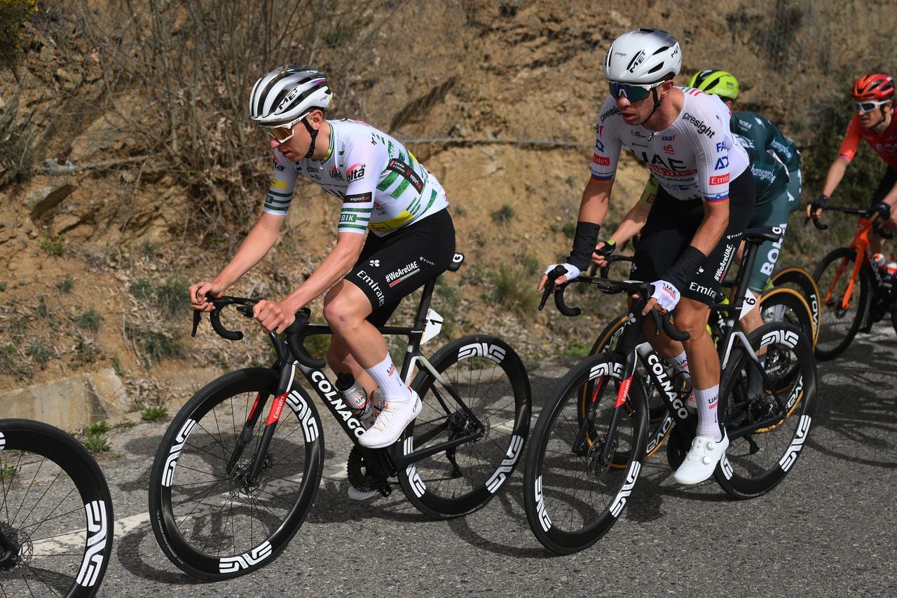 PORT AINE, SPAIN - MARCH 20: (L-R) Tadej Pogacar of Slovenia - Green Leader Jersey and Domen Novak of Slovenia and UAE Emirates Team compete during the 103rd Volta Ciclista a Catalunya 2024, Stage 3 a 176.7km stage from Sant Joan de les Abadesses to Port Aine 1967m / #UCIWT / on March 20, 2024 in Port Aine, Spain. (Photo by David Ramos/Getty Images)