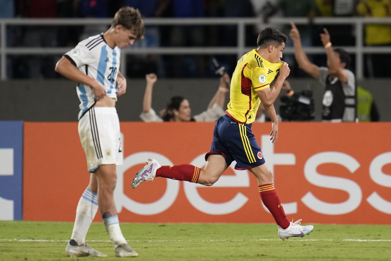 Colombia's Juan Fuentes celebrates scoring the opening goal against Argentina during a South America U-20 Championship soccer match in Cali, Colombia, Friday, Jan. 27, 2023. (AP Photo/Fernando Vergara)