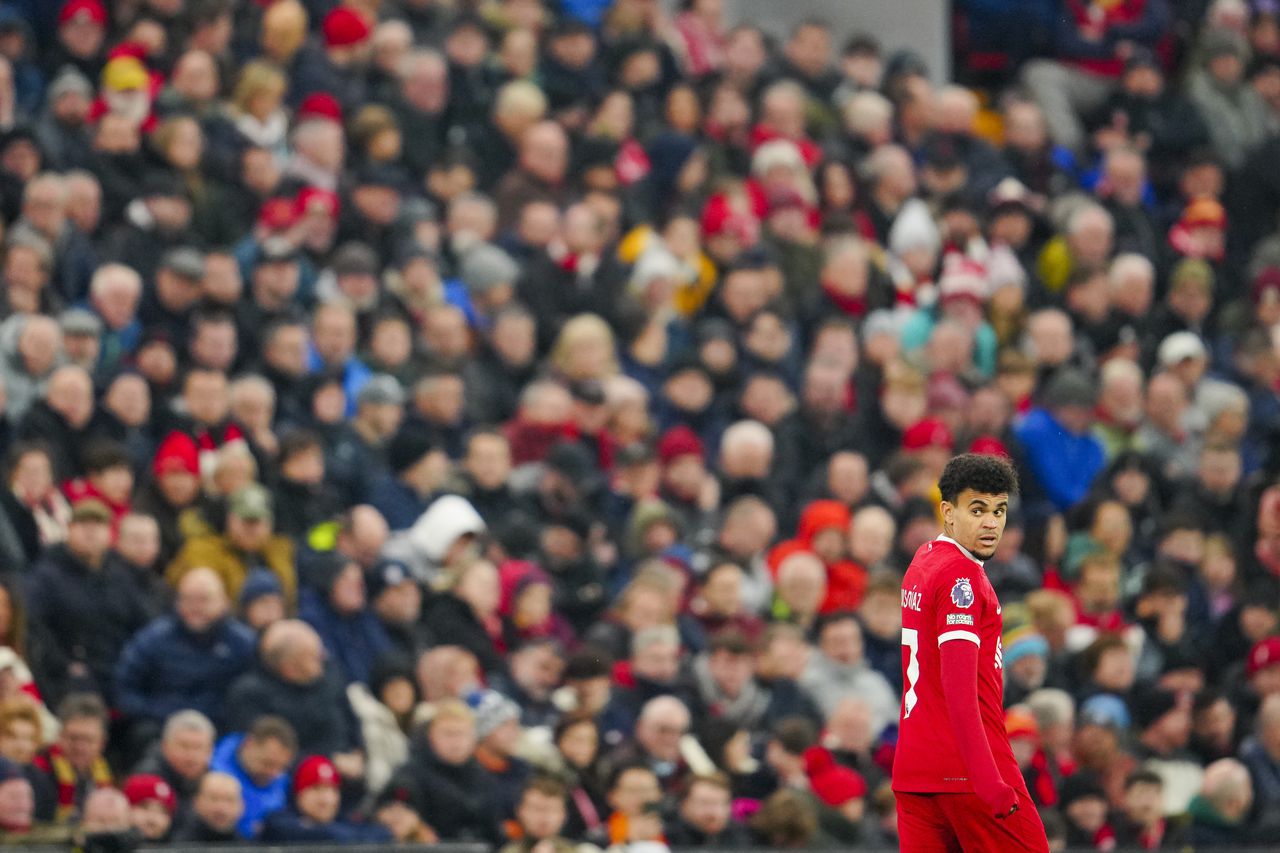 Liverpool's Luis Diaz enters to the pitch during the English Premier League soccer match between Liverpool and Brentford at Anfield stadium in Liverpool, England, Sunday, Nov. 12, 2023. (AP Photo/Jon Super)