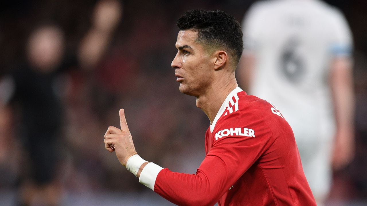 Manchester United's Portuguese striker Cristiano Ronaldo gestures during the English Premier League football match between Manchester United and Burnley at Old Trafford in Manchester, north-west England, on December 30, 2021. (Photo by Oli SCARFF / AFP) / RESTRICTED TO EDITORIAL USE. No use with unauthorized audio, video, data, fixture lists, club/league logos or 'live' services. Online in-match use limited to 120 images. An additional 40 images may be used in extra time. No video emulation. Social media in-match use limited to 120 images. An additional 40 images may be used in extra time. No use in betting publications, games or single club/league/player publications. /