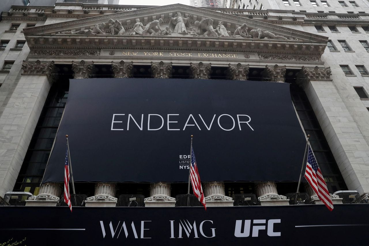 FILE PHOTO: The Endeavor Group Holdings Inc. (EDR) logo hangs from the New York Stock Exchange on the morning of its public listing at the NYSE in New York City, U.S., April 29, 2021. REUTERS/Shannon Stapleton/File Photo