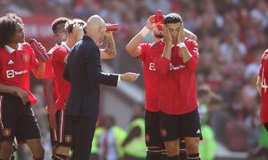 MANCHESTER, ENGLAND - JULY 31: Manchester United manager Erik ten Hag chats with Christiano Ronaldo of Manchester United during the Pre-Season Friendly match between Manchester United and Rayo Vallecano at Old Trafford on July 31, 2022 in Manchester, England. (Photo by Jan Kruger/Getty Images)