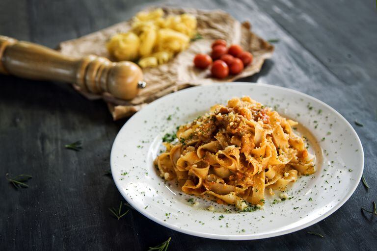 Homemade fettucine pasta with bolognese sause