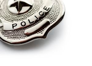 Police badge on white background.