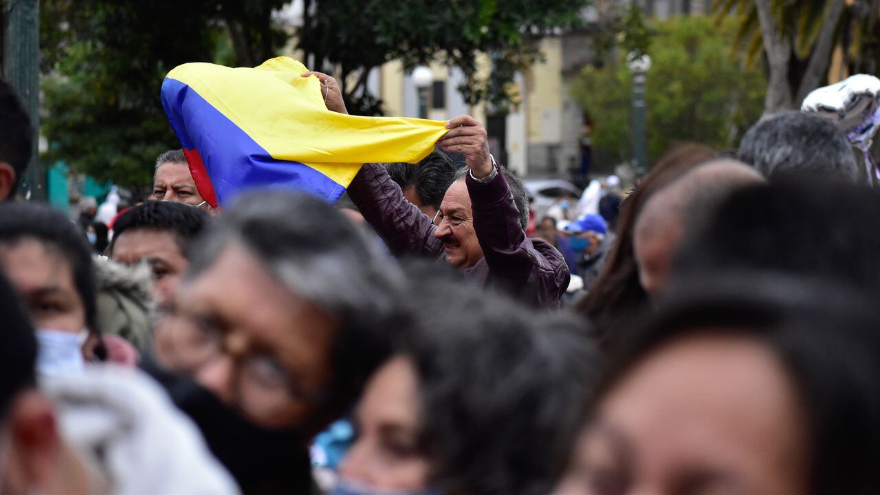 A suporter waves the Colombian flag during the candidacy announcement of a popular poll to determine the Historic Alliance between candidates Gustavo Petro, Francia Marquez and Arelis Uriana to run for Colombia's presidency on the 2022 Elections, in Pasto, Narino - Colombia, on September 25, 2021. (Photo by: Camilo Erasso/Long Visual Press/Universal Images Group via Getty Images)