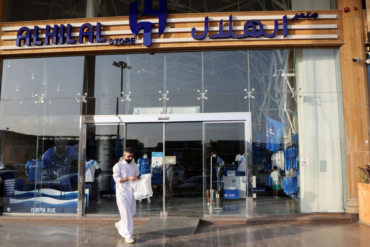 A person is seen walking outside Al Hilal Football Club's store in Riyadh, Saudi Arabia, August 14, 2023. REUTERS/Ahmed Yosri