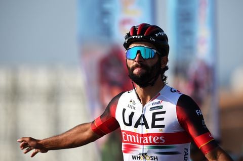 MUSCAT, OMAN - FEBRUARY 10: Fernando Gaviria Rendon of Colombia and UAE Team Emirates celebrates at finish line as stage winner ahead of Mark Cavendish of United Kingdom and Team Quick-Step - Alpha Vinyl during the 11th Tour Of Oman 2022 - Stage 1 a 138km stage from Al Rustaq Fort to Oman Convention and Exhibition Centre / #TourofOman / on February 10, 2022 in Muscat, Oman. (Photo by Dario Belingheri/Getty Images)