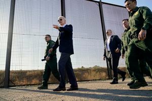FILE - President Joe Biden walks along a stretch of the U.S.-Mexico border in El Paso Texas, Jan. 8, 2023. The Biden administration has requested 1,500 troops for the U.S.-Mexico border amid an expected migrant surge following the end of pandemic-era restrictions. (AP Photo/Andrew Harnik, File)