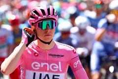 Pink Jersey, Team UAE's Slovenian rider Tadej Pogacar, takes the start of the 5th stage of the 107th Giro d'Italia cycling race, 178 km between Genova and Lucca, on May 8, 2024 in Genova. (Photo by Luca Bettini / AFP)
