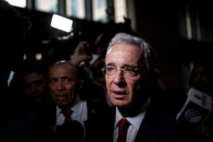 BOGOTA - COLOMBIA, OCTOBER 08: Former Colombian president, Alvaro Uribe speaks as he arrives to the Supreme Court to face a historical judicial investigation over alleged witness tampering in Bogota, Colombia on October 08, 2019. In a landmark case that has deeply polarized Colombia, former president Álvaro Uribe will testify before the Supreme Court on October 8, marking the first time that a former president will appear before the court in an investigation that could eventually result in him facing criminal charges. The investigation has serious implications for the independence of Colombias justice institutions, as well as the ongoing efforts to uncover the full truth about the powerful political networks that backed paramilitary death squads during Colombias decades-long conflict. (Photo by Juancho Torres/Anadolu Agency via Getty Images)
