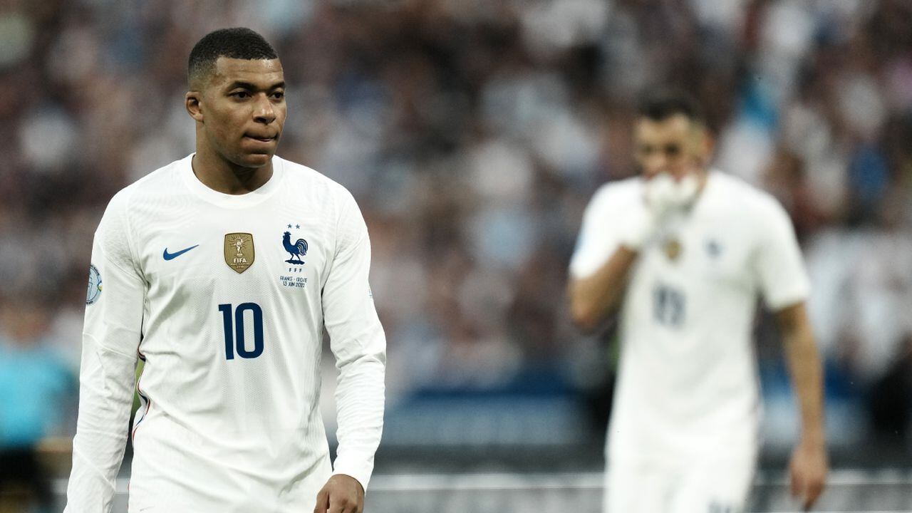 France's Kylian Mbappe, left, leaves the field after half time of the UEFA Nations League soccer match between France and Croatia at the Stade de France in Saint Denis near Paris, Monday, June 13, 2022. (AP/Thibault Camus)