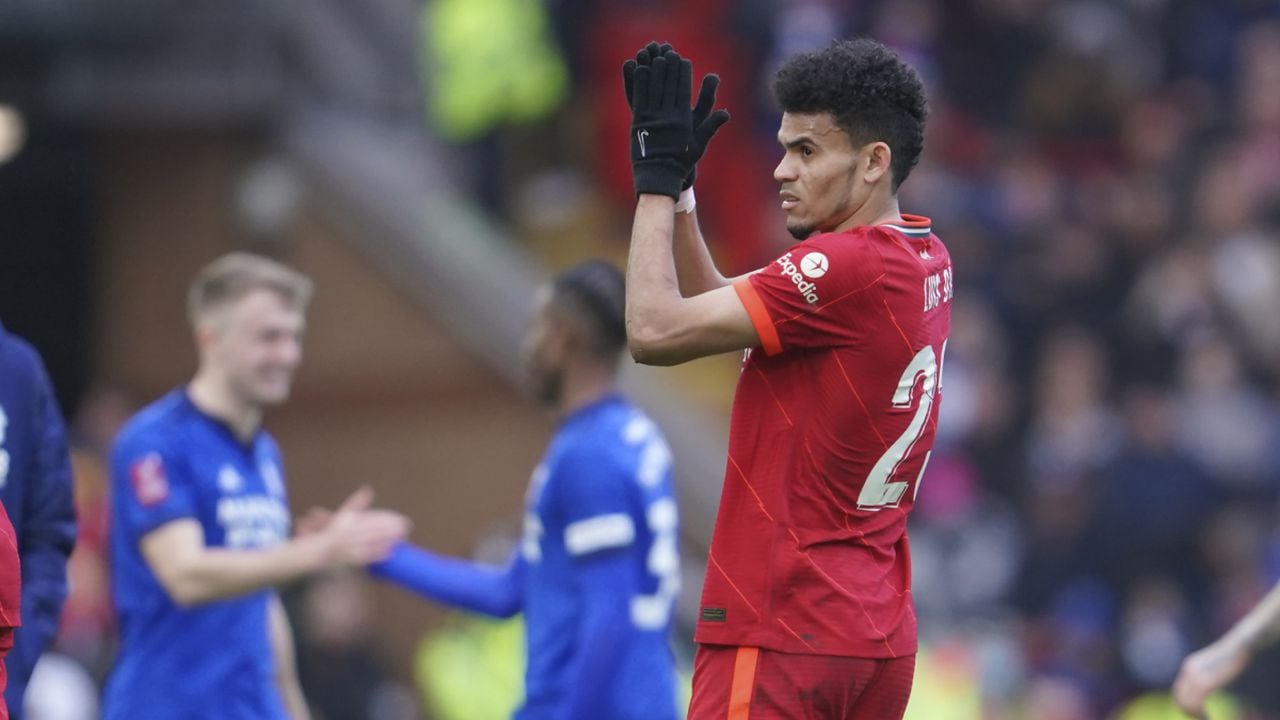 Liverpool's Luis Diaz, center, applauds spectators after the FA Cup fourth round soccer match between Liverpool and Cardiff City at Anfield stadium in Liverpool, England, Sunday, Feb. 6, 2022. (AP/Jon Super)