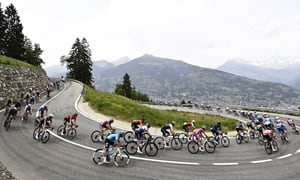 Cyclists pedal during 15th stage of the Giro D'Italia cycling race from Rivarolo Canavese to Cogne, Italy, Sunday, May 22, 2022. (Fabio Ferrari/LaPresse via AP)