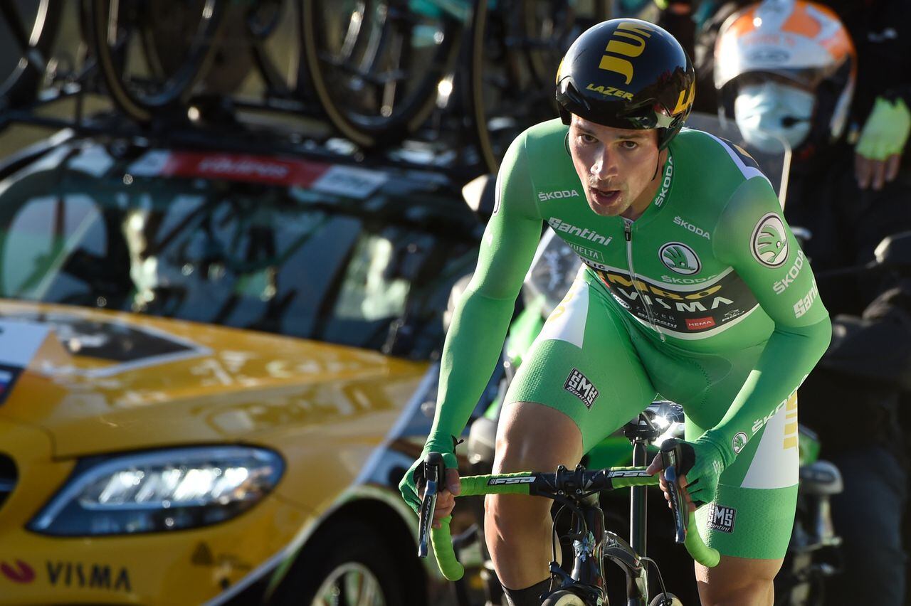 Team Jumbo rider Slovenia's Primoz Roglic competes the 13th stage of the 2020 La Vuelta cycling tour of Spain, a 33.7-km individual time-trial from Muros to Mirador de Ezaro - Dumbria, on November 3, 2020. - Slovenian Primoz Roglic claimed victory in the Vuelta a Espana time trial on today to regain the lead in the overall classification. Roglic took back the red jersey from Ecuador's Richard Carapaz while Britain's Hugh Carthy sits third ahead of the race's climax on November 1, 2020. (Photo by MIGUEL RIOPA / AFP)