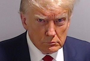 Former U.S. President Donald Trump is shown in a police booking mugshot released by the Fulton County Sheriff's Office, after a Grand Jury brought back indictments against him and 18 of his allies in their attempt to overturn the state's 2020 election results in Atlanta, Georgia, U.S., August 24, 2023. Fulton County Sheriff's Office/Handout via REUTERS  THIS IMAGE HAS BEEN SUPPLIED BY A THIRD PARTY.  THIS PICTURE WAS PROCESSED BY REUTERS TO ENHANCE QUALITY. AN UNPROCESSED VERSION HAS BEEN PROVIDED SEPARATELY.