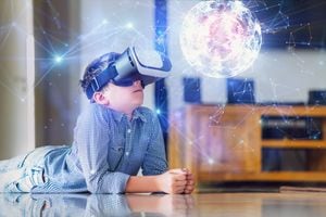 Cute Boy Browsing a Virtual World in Virtual Reality Glasses