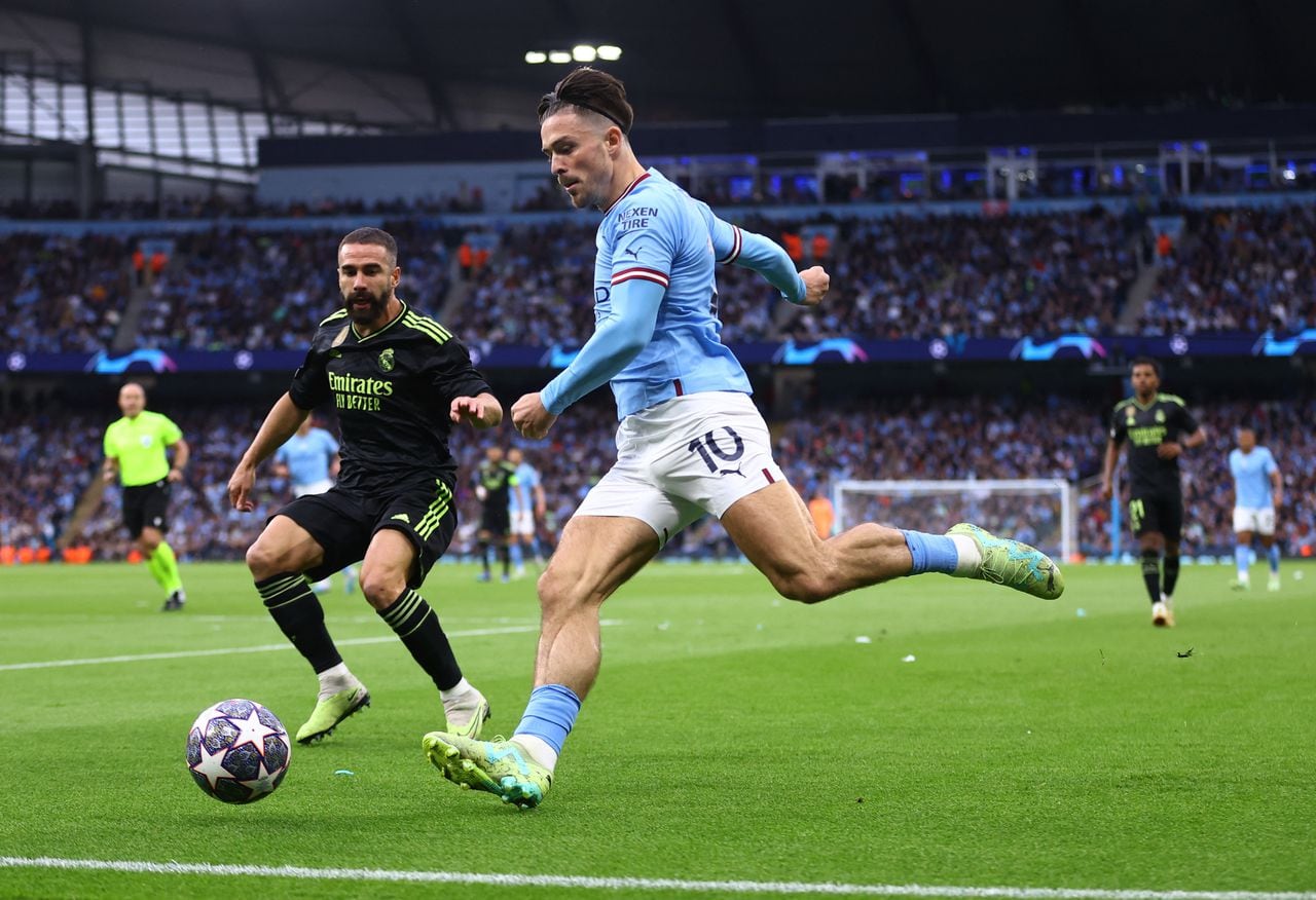 Soccer Football - Champions League - Semi Final - Second Leg - Manchester City v Real Madrid - Etihad Stadium, Manchester, Britain - May 17, 2023 Manchester City's Jack Grealish in action with Real Madrid's Dani Carvajal REUTERS/Carl Recine