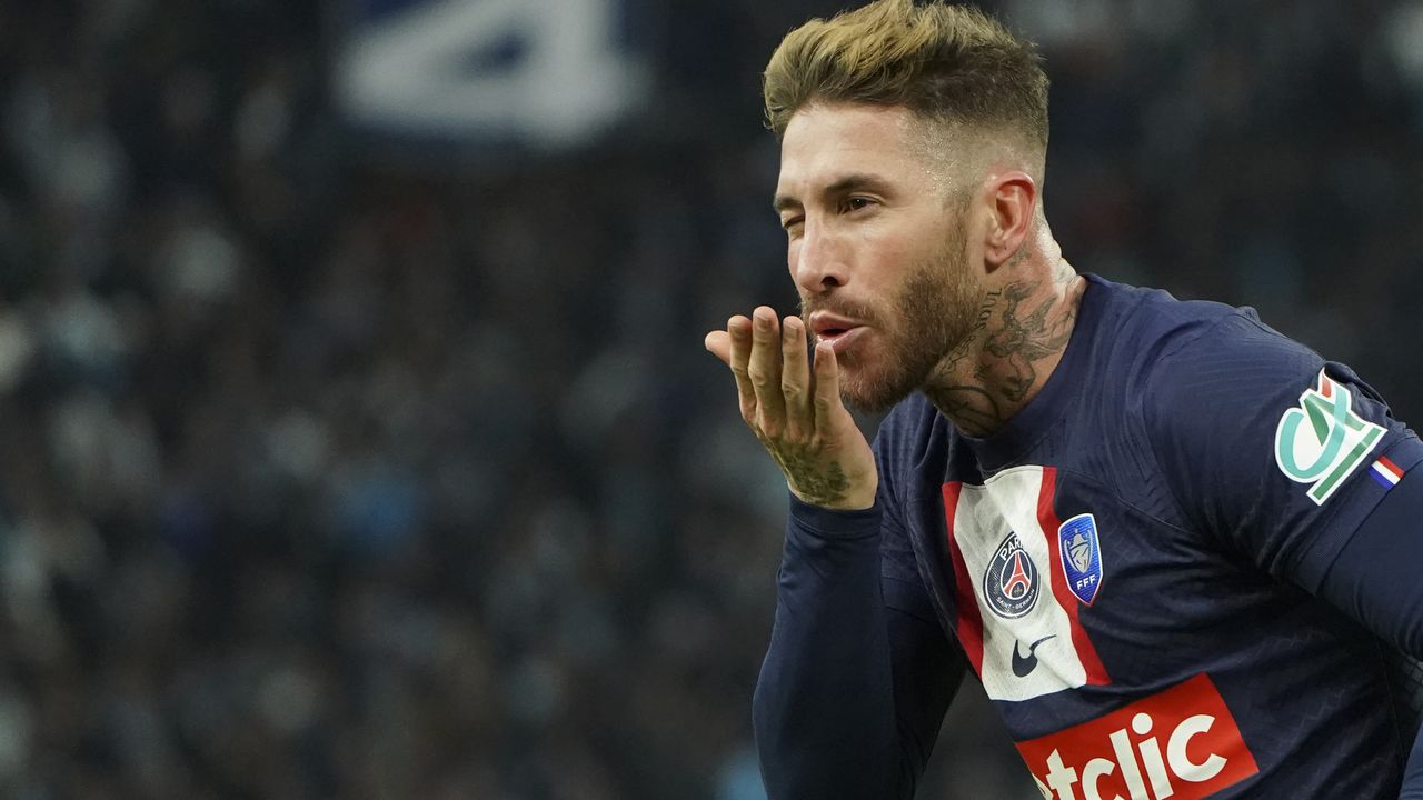 PSG's Sergio Ramos celebrates after scoring his side's opening goal during the French Cup soccer match between Olympique de Marseille and Paris Saint Germain at the Velodrome stadium in Marseille, southern France, Wednesday, Feb. 8, 2023. (AP Photo/Laurent Cipriani)