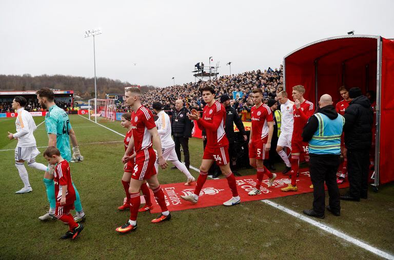 Soccer Football - FA Cup - Fourth Round - Accrington Stanley v Leeds United - Wham Stadium, Accrington, Britain - January 28, 2023 Accrington Stanley's Douglas Tharme walks onto the pitch with players before the match Action Images via Reuters/Jason Cairnduff