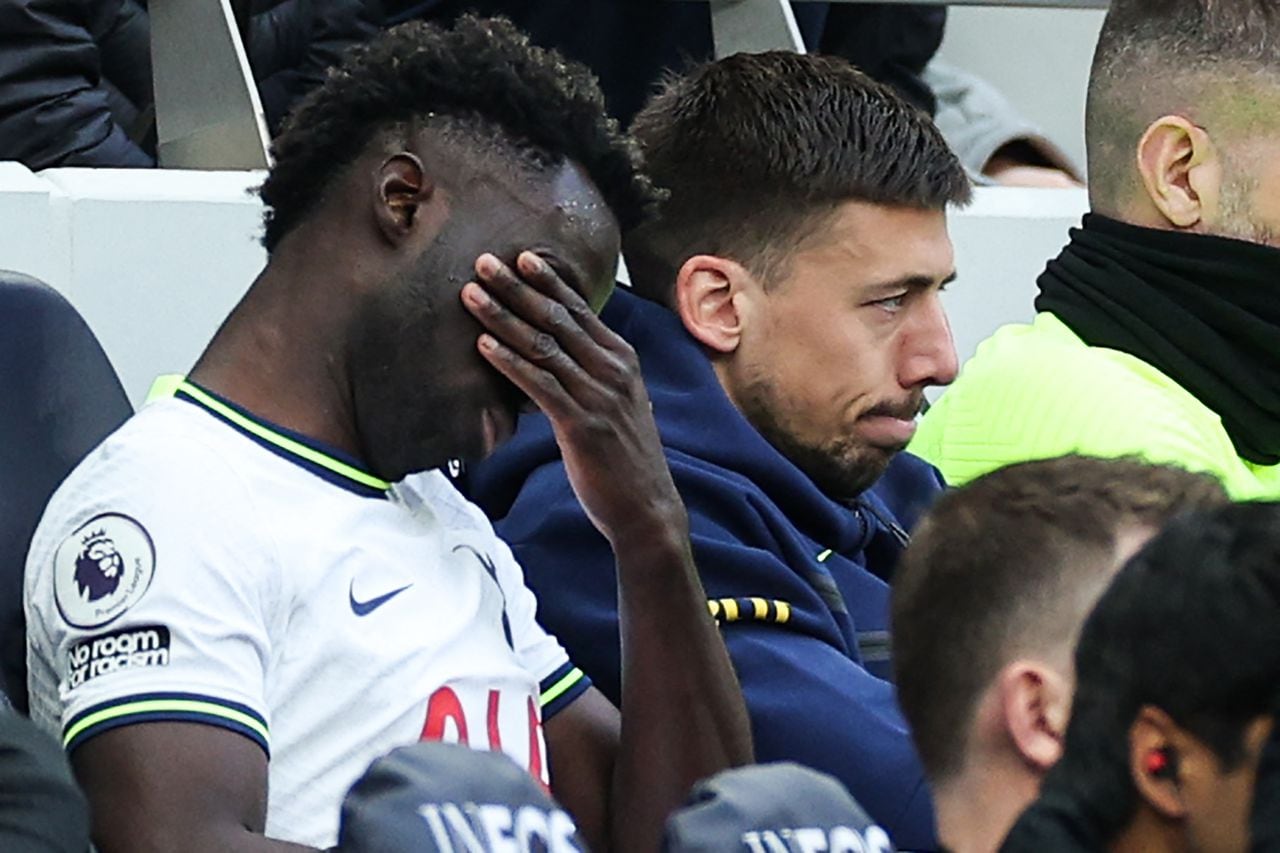 Tottenham Hotspur's Colombian defender Davinson Sanchez reacts after being sent off the pitch during the English Premier League football match between Tottenham Hotspur and Bournemouth at Tottenham Hotspur Stadium in London, on April 15, 2023. (Photo by Adrian DENNIS / AFP) / RESTRICTED TO EDITORIAL USE. No use with unauthorized audio, video, data, fixture lists, club/league logos or 'live' services. Online in-match use limited to 120 images. An additional 40 images may be used in extra time. No video emulation. Social media in-match use limited to 120 images. An additional 40 images may be used in extra time. No use in betting publications, games or single club/league/player publications. /