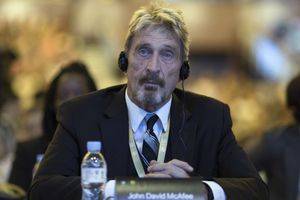 FILE - In this Tuesday, Aug. 16, 2016 file photo, software entrepreneur John McAfee listens during the 4th China Internet Security Conference (ISC) in Beijing. McAfee, the creator of the McAfee antivirus software, was found dead in a prison near Barcelona Wednesday, June 23, 2021, hours after Spain’s National Court approved his extradition to the to the United States, where he was wanted on tax-related criminal charges. He was 75. (AP Photo/Ng Han Guan, File)