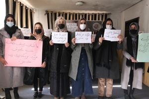 KABUL, AFGHANISTAN - DECEMBER 21: Afghan female students react against Taliban's university ban in Kabul, Afghanistan on December 21, 2022. (Photo by Bilal Guler/Anadolu Agency via Getty Images)