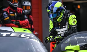 Nine-time MotoGP world champion, Valentino Rossi prepares to get into his Audi R8 Lms to compete in the Fanatec GT World Challenge Europe 2022 on April 03, 2022 at the Imola race track, Italy. Rossi has signed with Belgian team Wrt and will race an Audi R8 Lms, bearing the unmistakable number 46 in the Fanatec Challenge Europe championship.
Andrea SCIARRA / AFP