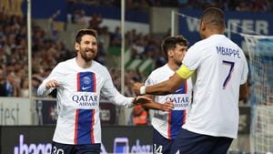STRASBOURG, FRANCE - MAY 27: Lionel Messi #30 of Paris Saint-Germain celebrates his goal with Juan Bernat #14 during the Ligue 1 match between RC Strasbourg and Paris Saint-Germain at Stade de la Meinau on May 27, 2023 in Strasbourg, France. (Photo by Xavier Laine/Getty Images)