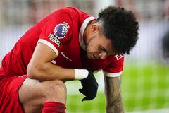 Liverpool's Luis Diaz is dejected after failing to score during the English Premier League soccer match between Liverpool and Luton Town, at Anfield stadium in Liverpool, England, Wednesday, Feb. 21, 2024. (AP Photo/Jon Super)