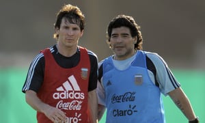 (FILES) In this file photo taken on March 24, 2009 Argentina's football team coach Diego Maradona speaks with forward Lionel Messi (L) during a training session in Ezeiza, Buenos Aires on March 24, 2009. Argentina will meet Venezuela next March 28 for their FIFA World Cup South Africa 2010 qualifier at the Monumental stadium in Buenos Aires. Next November 25, 2021 marks the first anniversary of Diego Maradona's death.
Juan MABROMATA / AFP
