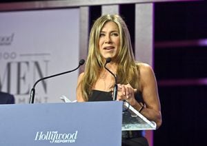 LOS ANGELES, CALIFORNIA - DECEMBER 08: Honoree Jennifer Aniston accepts the Sherry Lansing Leadership Award onstage at The Hollywood Reporter 2021 Power 100 Women in Entertainment, presented by Lifetime at Fairmont Century Plaza on December 08, 2021 in Los Angeles, California. (Photo by Stefanie Keenan/Getty Images for The Hollywood Reporter)