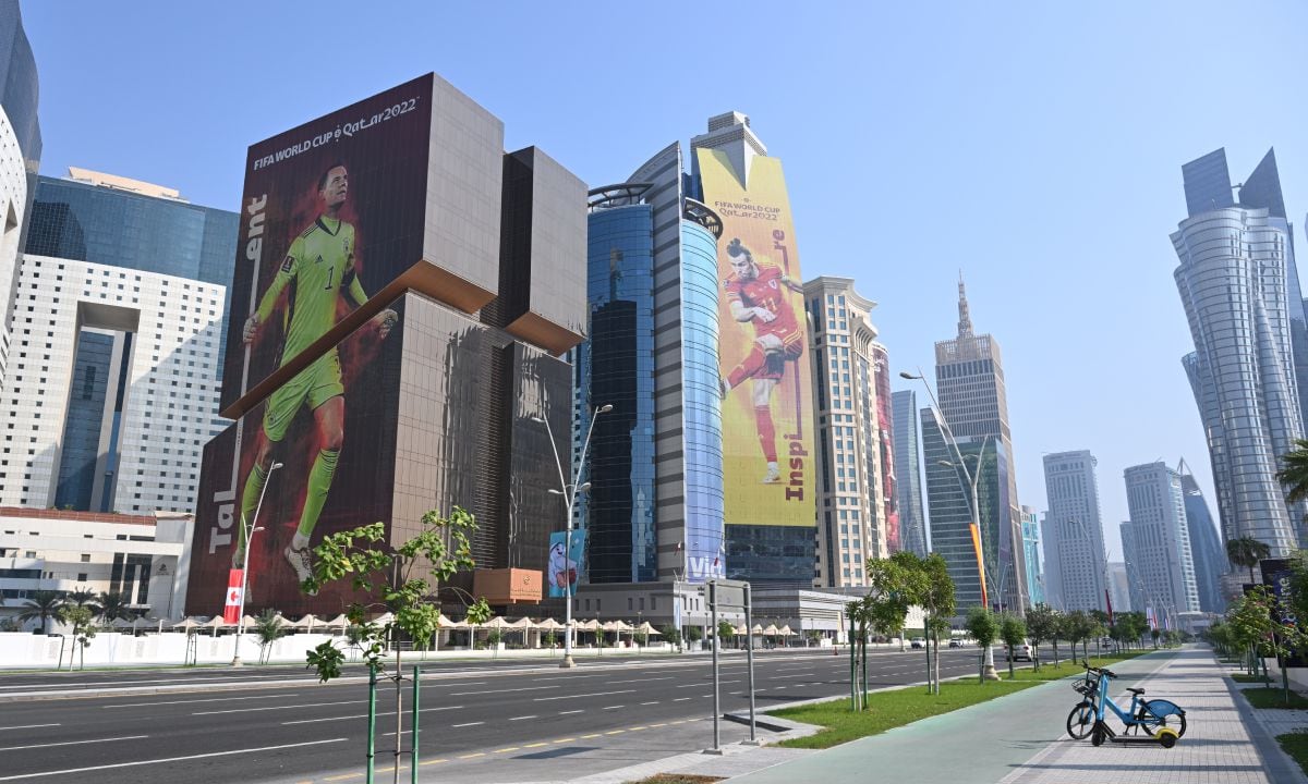 The likeness of Manuel Neuer and Gareth Bale on 2022 FIFA World Cup posters covering West Bay skyscrapers in Doha, Qatar on 15 October 2022. (Photo by Getty Images/Simon Holmes/NurPhoto)