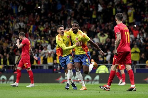 MADRID, SPAIN - MARCH 26: Jhon Cordoba of Colombia celebrates scoring his team's first goal with teammate James Rodriguez during the international friendly match between Romania and Colombia at Civitas Metropolitan Stadium on March 26, 2024 in Madrid, Spain.  (Photo by Gonzalo Arroyo Moreno/Getty Images)