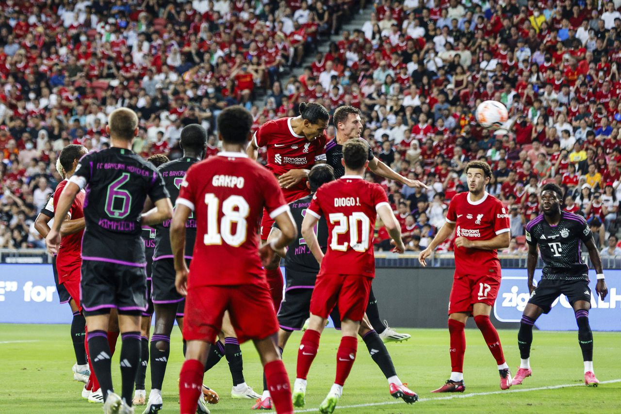 Virgil van Dijk of Liverpool FC scores the second goal during the preseason friendly football match between Liverpool Fc and FC Bayern Munchen in Singapore, Tuesday, August 2nd, 2023. (AP Photo/Danial Hakim)