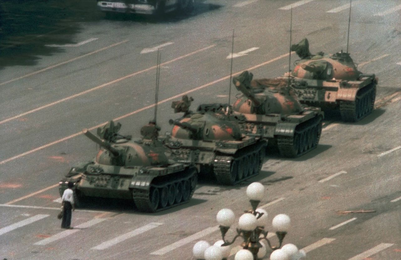 FILE - In this June 5, 1989, file photo, a man stands alone in front of a line of tanks heading east on Beijing's Changan Blvd. in Tiananmen Square, Beijing. Hong Kong’s second ban on an annual vigil for victims of the bloody June 4, 1989, crackdown on Beijing’s Tiananmen Square protest movement and the closure of a museum dedicated to the event may be a further sign that the ruling Communist Party is extending its efforts to erase the event from the collective consciousness from the mainland to Hong Kong. (AP Photo/Jeff Widener, File)