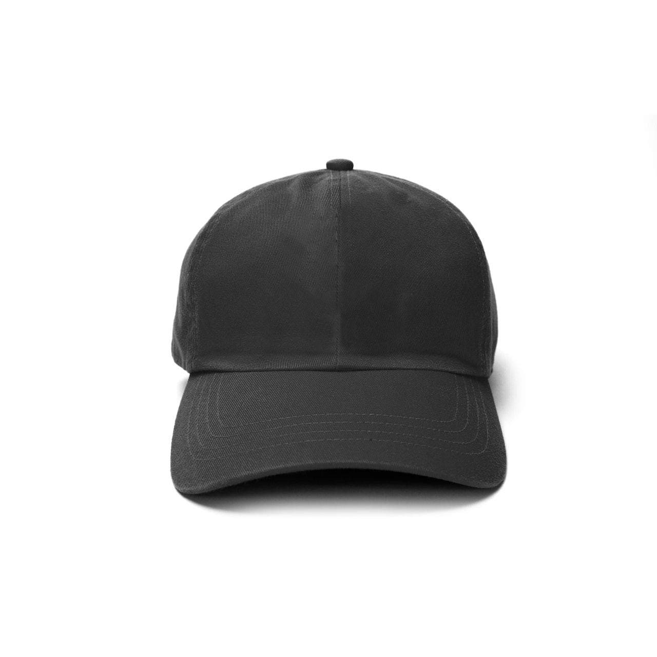 Photograph in New York City. April 16th 2002. A black baseball cap on a white background ready for logo branding.
