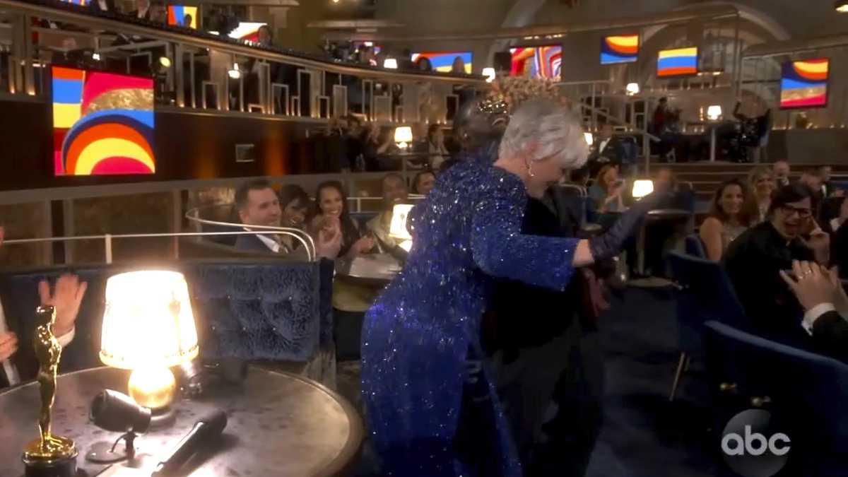 In this video image provided by ABC, Lil Rel Howery reacts as Glenn Close dances to E.U.'s "Da Butt" in the audience at the Oscars on Sunday, April 25, 2021. (ABC via AP)