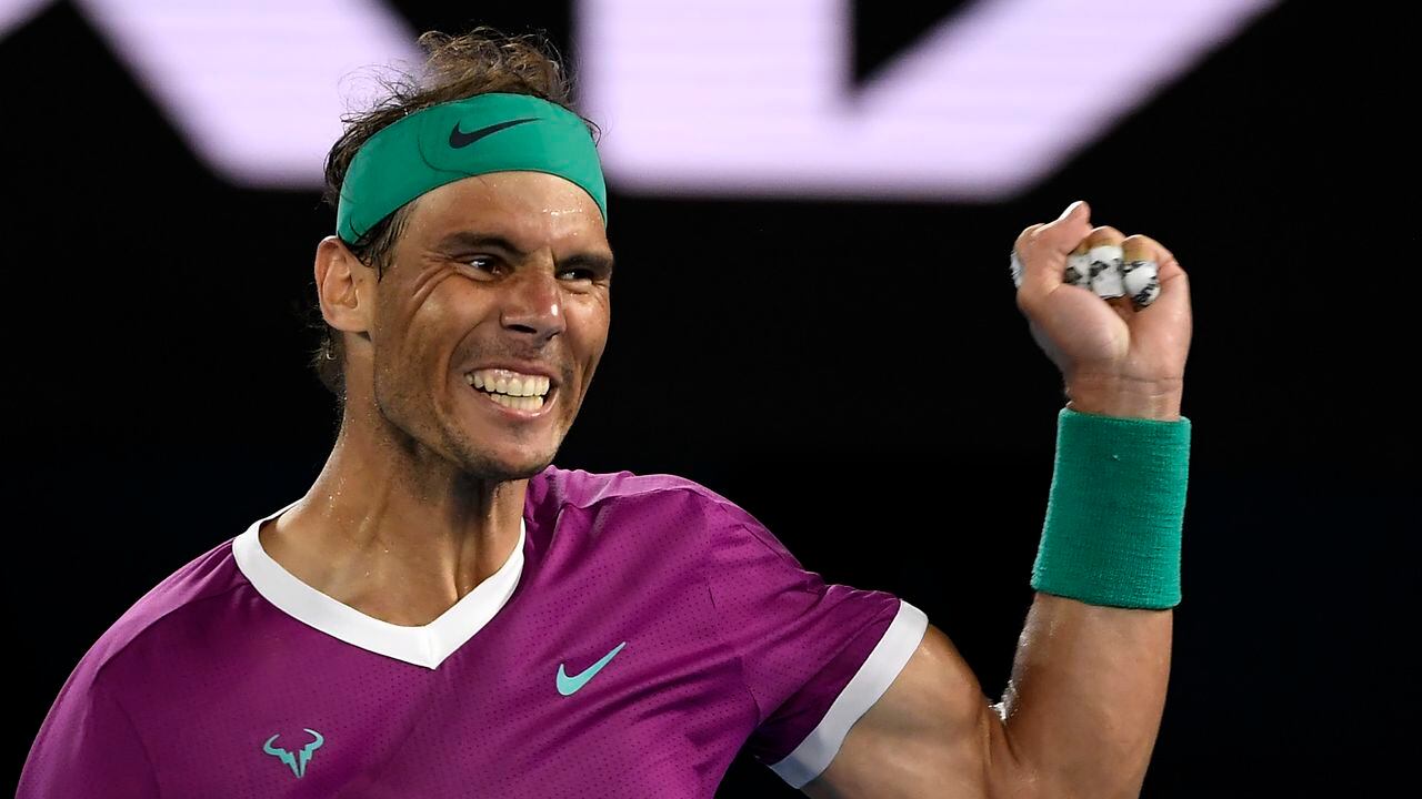 Rafael Nadal of Spain celebrates after defeating Matteo Berrettini of Italy in their semifinal match at the Australian Open tennis championships in Melbourne, Australia, Friday, Jan. 28, 2022.(AP Photo/Andy Brownbill)