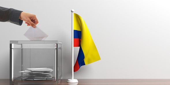 Glass ballot box and a small Colombia flag. 3d illustration