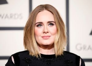 FILE PHOTO: Singer Adele arrives at the 58th Grammy Awards in Los Angeles, California February 15, 2016. REUTERS/Danny Moloshok/File Photo