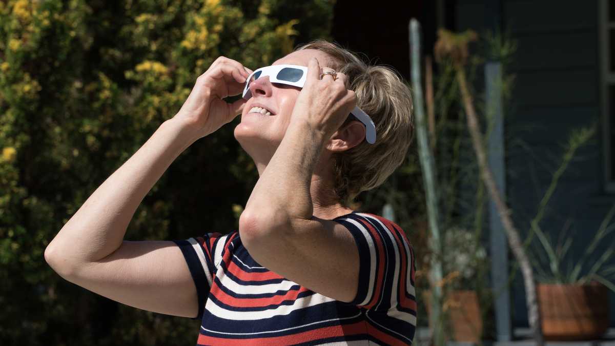 Woman Watching Eclipse