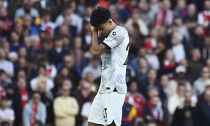 Liverpool's Luis Diaz leaves the field after injuring during the English Premier League soccer match between Arsenal and Liverpool at Emirates Stadium in London , Sunday, Oct. 9, 2022. (AP Photo/Rui Vieira)