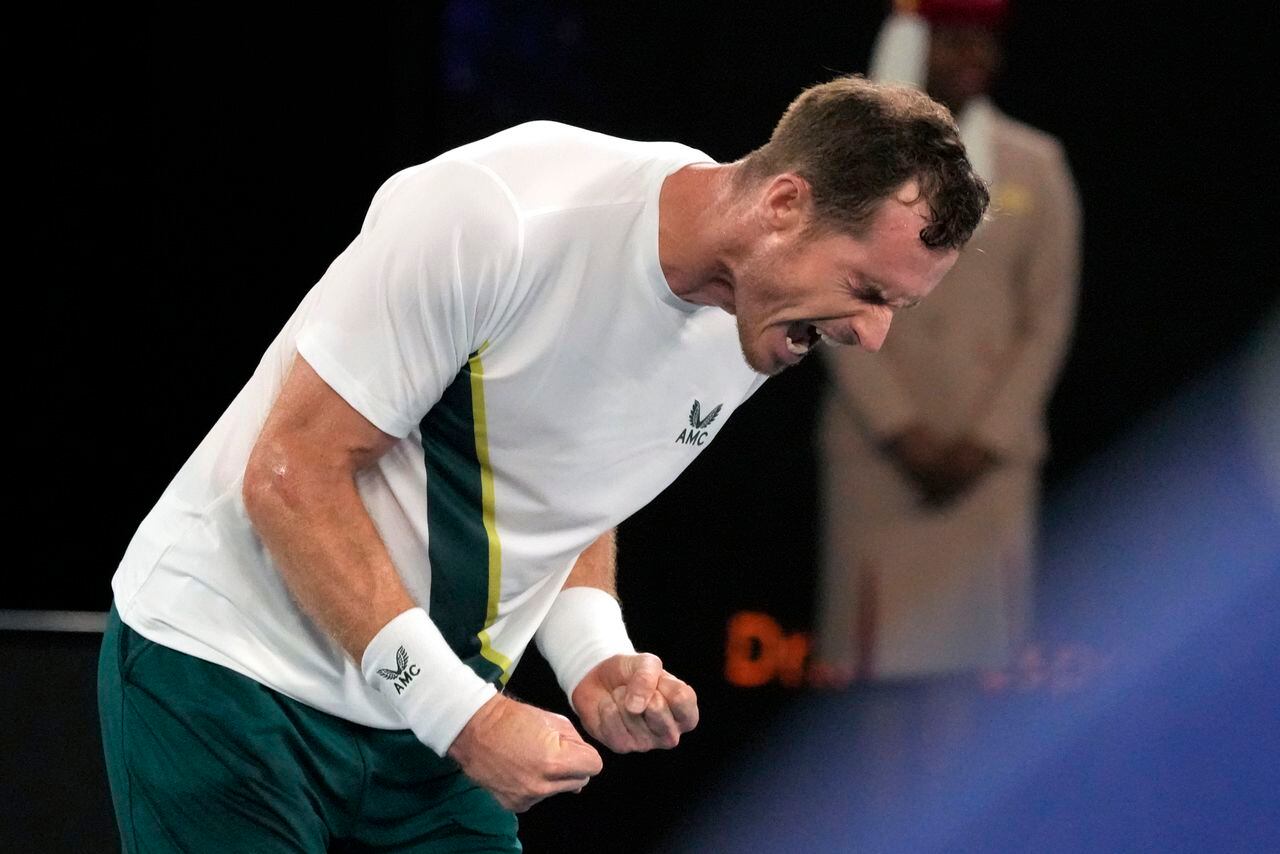 Andy Murray of Britain reacts after defeating Matteo Berrettini of Italy in their first round match at the Australian Open tennis championship in Melbourne, Australia, Tuesday, Jan. 17, 2023. (AP Photo/Aaron Favila)
