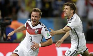 , BRAZIL - JULY 13: Mario Gotze of Germany celebrates 0-1 with Thomas Muller of Germany during the World Cup match between Germany v Argentina on July 13, 2014 (Photo by Laurens Lindhout/Soccrates/Getty Images)