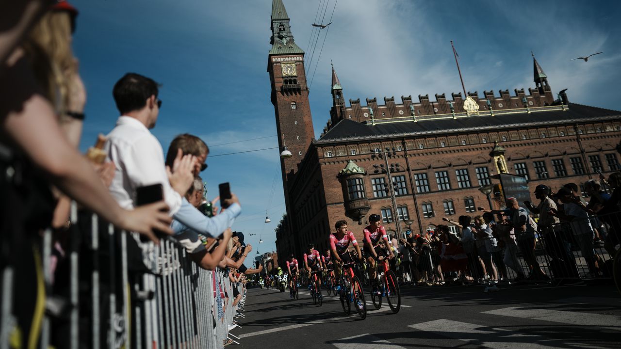 EF Education-EasyPost riders ride during the team presentation ahead of the Tour de France cycling race in Copenhagen, Denmark, Wednesday, June 29, 2022. The race starts Friday, July 1, the first stage is an individual time trial over 13.2 kilometers (8.2 miles) with start and finish in Copenhagen. (AP Photo/Thibault Camus)