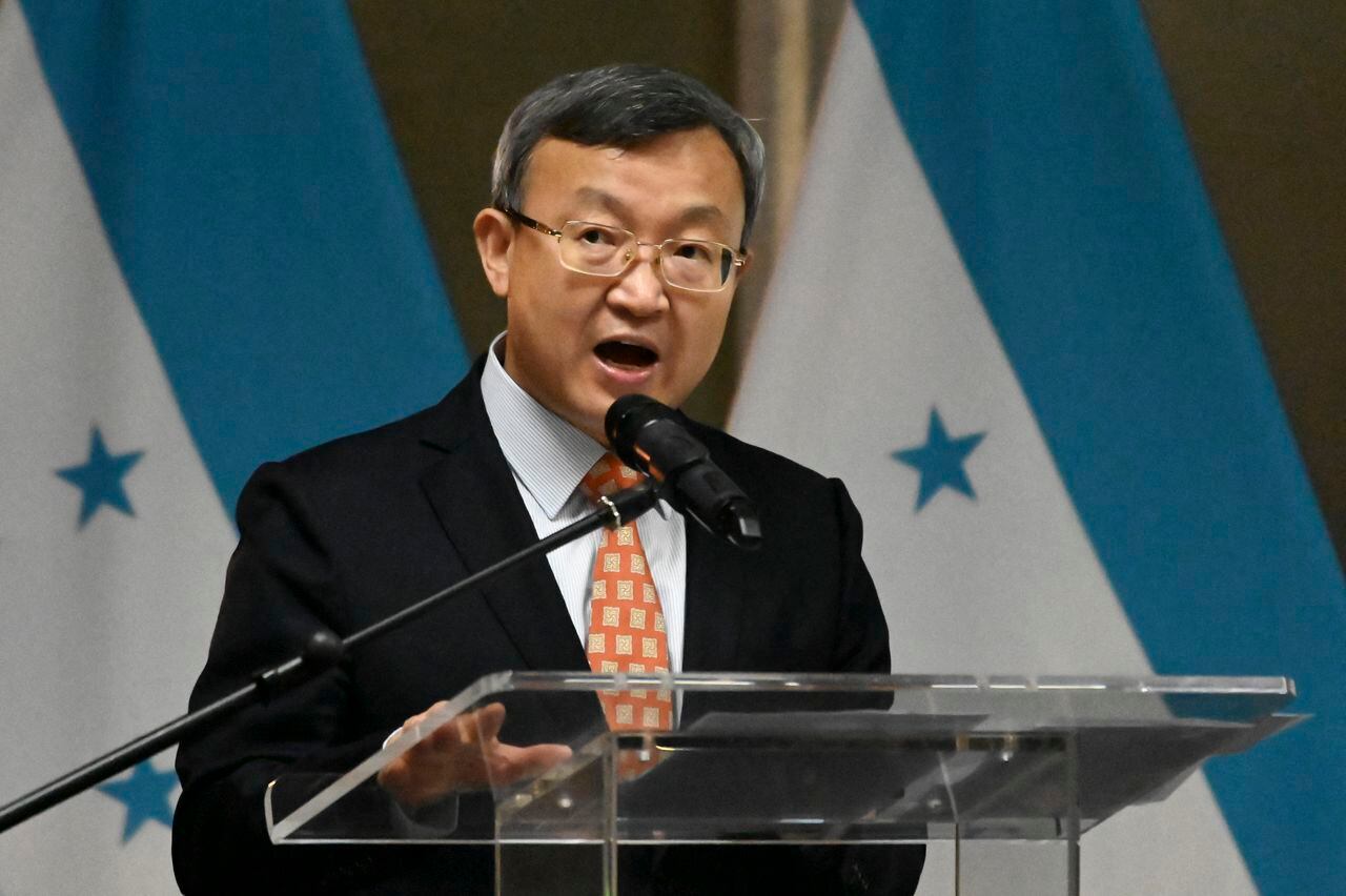 Gobiernos de China y Honduras buscan sellar el TLC entre los dos países. (Photo by Orlando SIERRA / AFP)
