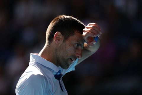 MELBOURNE, AUSTRALIA - JANUARY 26: Novak Djokovic of Serbia reacts in their Semifinal singles match against Jannik Sinner of Italy during the 2024 Australian Open at Melbourne Park on January 26, 2024 in Melbourne, Australia. (Photo by Julian Finney/Getty Images)